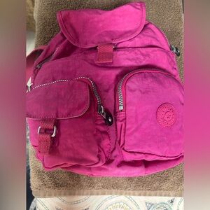 KIPLING Lovebug bright pink nylon backpack. Missing monkey key chain. Never used